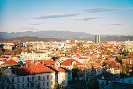 Ljubljana, Slovenia - January 15, 2019: Panoramic view of the city center at Ljubljana and mountains...