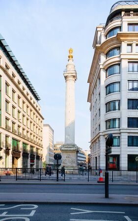 London, UK - April 29, 2011: Great fire monument column in London city in the UK. Historical statue memorial architecture. View on English sculpture in Old town, England, United Kingdom, in springのeditorial素材