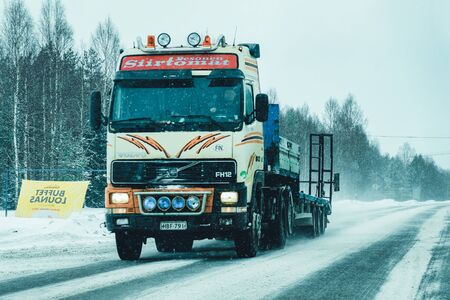 Rovaniemi, Finland - March 1, 2017: Truck in a Snowy winter Road, of Finland in Lapland.のeditorial素材