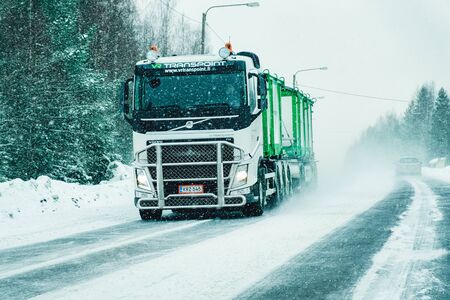 Rovaniemi, Finland - March 1, 2017: Truck in a Snowy winter Road at Finland in Lapland.のeditorial素材