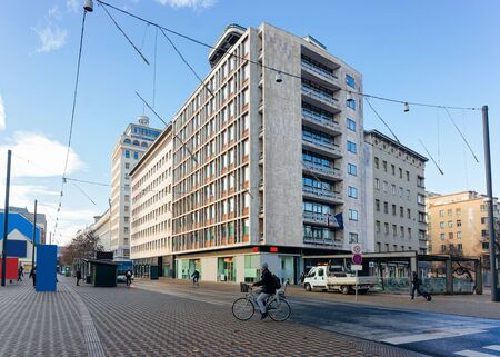Ljubljana, Slovenia - January 14, 2019: Man on bicycle on Street and cityscape of Ljubljana old town, Slovenia, Europe. People in Slovenian city view in winter. Urban green capital. Travelのeditorial素材