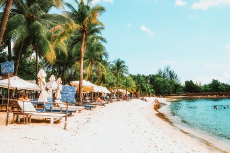 Singapore, Singapore - March 1, 2016: Shore and Siloso Beach at the Sentosa island resort in Singapore. It is an artificial beach with a sand taken from Malaysia and Indonesia. Tonedのeditorial素材