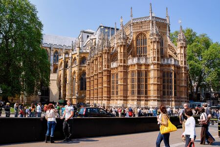 London, UK - April 30, 2011: Crowds of people at Westminster Abbey in London old town in United Kingdom. Church in City capital of UK. England in spring. Cityscape at day.のeditorial素材