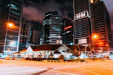 Singapore, Singapore - February 29, 2016: Telok Ayer Market and Singapore Stock Exchange building late in evening in Singaporeのeditorial素材