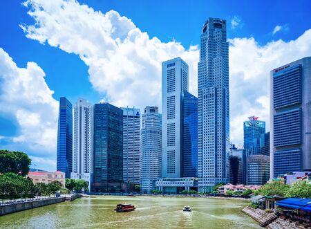 Singapore, Singapore - March 1, 2016: Skyscrapers of Downtown Core along Quay District embankment of Singapore. UOB Plaza and One Raffles Place buildings on background.のeditorial素材