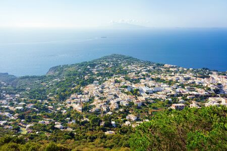 Cityscape and landscape in Capri Island at Naples in Italy. Landscape at Blue Mediterranean Sea at Italian coast. Anacapri in Europe. View in summer. Amalfi scenery and Solaro mountainの写真素材