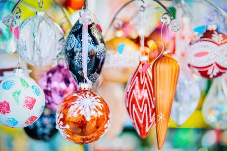 Glass Christmas tree decorations at Christmas market of Germany in Europe in winter. German Night street Xmas and holiday fair in European city or town, December. Berlin in Gendarmenmarktの写真素材