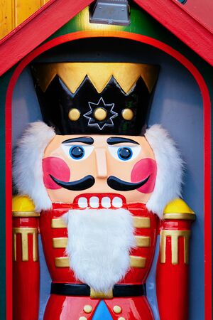 Wooden Christmas nutcracker toy on Christmas market at Germany in Europe in winter. German street Xmas fair in European city or town. Berlin in Alexanderplatzの写真素材