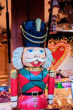 Wooden Christmas nutcracker toy at Christmas market at Germany in Europe in winter. German street...