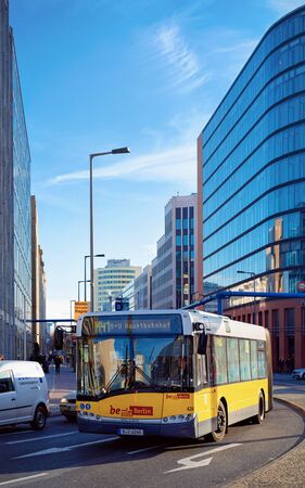 Berlin, Germany - December 13, 2017: Street with Bus in the road and modern building architecture in Potsdamer Platz Square in German City centre in Berlin in Germany in Europe.のeditorial素材