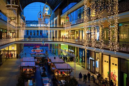 Berlin, Germany - December 12, 2017: Mall of Berlin decorated for Christmas and New Year in Berlin in Germany in Europe at winter. Xmas holiday atmosphere in European city on December.のeditorial素材