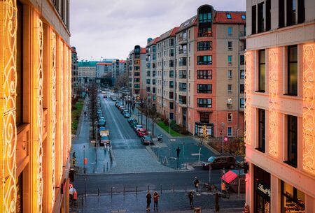 Berlin, Germany - December 8, 2017: View on the evening street from Shopping center mall in German City centre in Berlin in Germany in Europe in the evening. Building architectureのeditorial素材