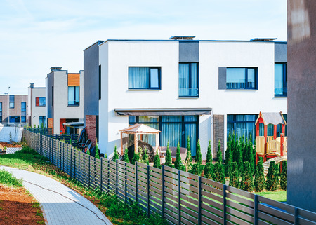 Apartment residential home and house building complex with gate conceptのeditorial素材