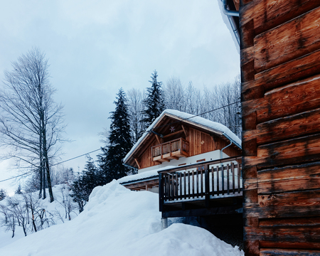 House architecture and snow winter landscape in Bad Goisern village near Hallstatt, of Upper...