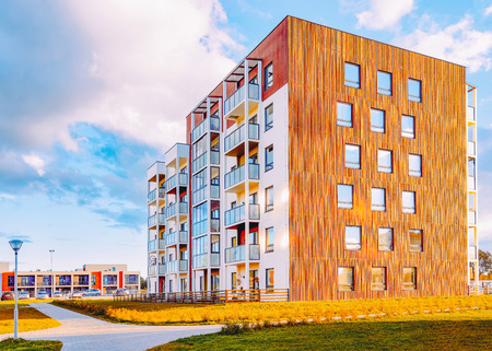 Apartment new house residential building outdoor concept. Street and backgrounds.のeditorial素材