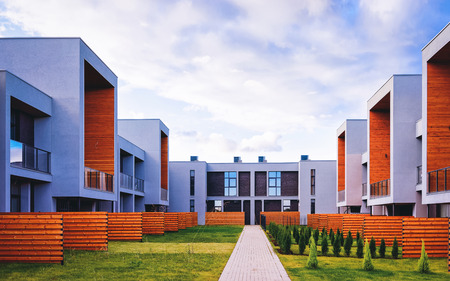Apartment residential townhouse building with outdoor concept. Street and backgrounds.のeditorial素材