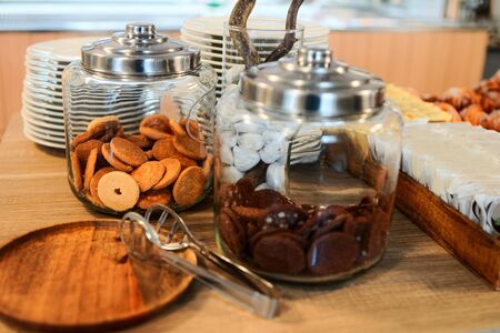 Danish Biscuits pastry in cafe and bakery. Sweets with butter and chocolate at patisserie. Food for breakfast. Beautiful fresh baked desert. Gourmet and cuisine on table. Homemade Dessertの写真素材