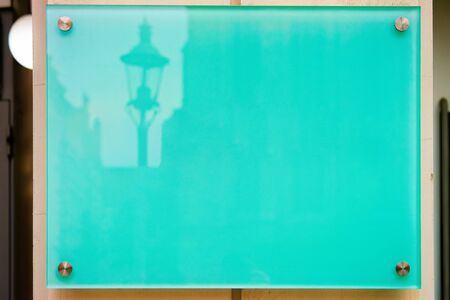 Blank Street plate on building wall in Vienna, Austria. Empty name sign board on house in Innere Stadt in Wiena. Place for copy space. Concept and architecture. Texture and background. Blue colorの写真素材