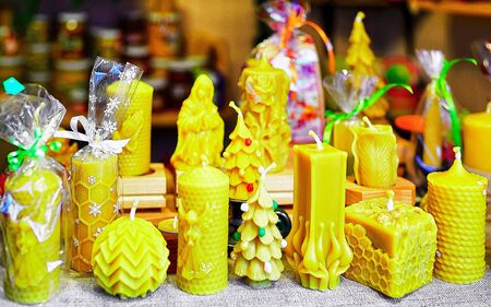 Decorated candles displayed for sale at Riga Christmas market newの写真素材