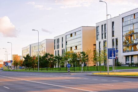 Modern apartment residential building complex with street
