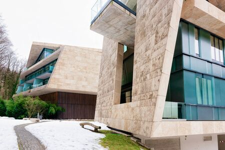 Modern residential apartment and flat buildings exterior at Salzburg snowの写真素材