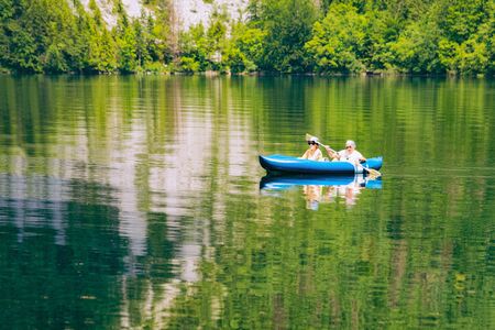 Scenery of senior people canoeing on Bohinj Lakeのeditorial素材
