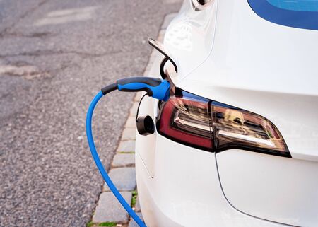 Electric Car Charging station in Vienna of Austria. Battery hybrid vehicle eco charger. Future...