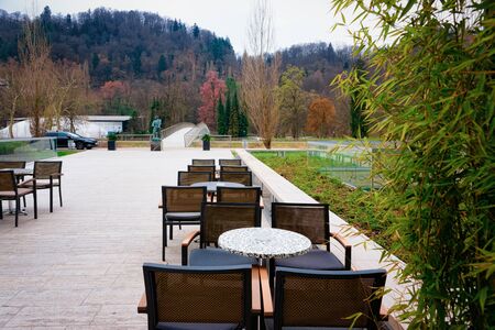 Cityscape with street cafe in the park in Celje old town in Slovenia. Architecture in Slovenija....