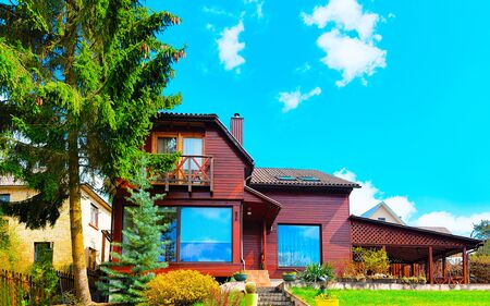 Apartment in residential building exterior. Housing structure at blue modern house of Europe. Rental home in city district on summer. Wall and glass high architecture for business property investment.の写真素材