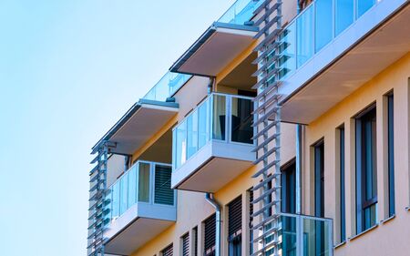 Apartment in residential building exterior. Housing structure at blue modern house of Europe. Rental home in city district on summer. Architecture for business property investment, Leibnitz Austria.の写真素材