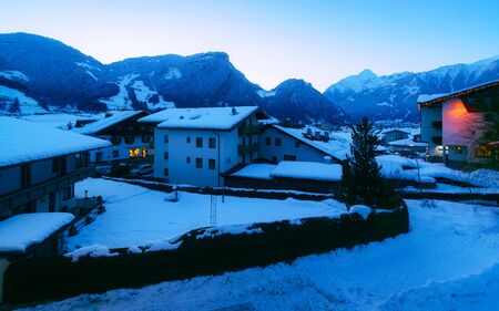 Apartment in residential building exterior. Housing structure at blue modern house of Europe. Rental home in city district on summer. Architecture for business property investment, Mayrhofen Austria.の写真素材