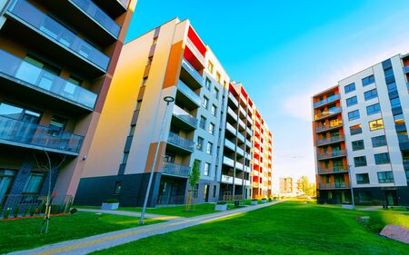 Apartment in residential building exterior. Housing structure at blue modern house of Europe. Rental...