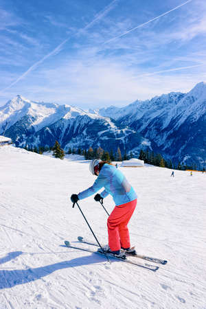 Woman Skier skiing on Penken Park in Tyrol in Austriaの写真素材