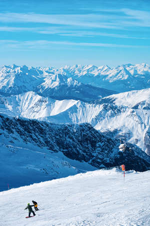 Men Skier and snowboarder on Hintertux Glacier of Austriaの写真素材