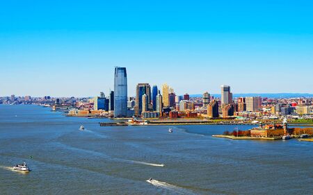 Aerial view of Governors Island with Brooklyn and Skyline with Skyscrapers in Financial Center, Manhattan Area, New York City, America. USA. American architecture building. Panorama of Metropolis NYCの写真素材