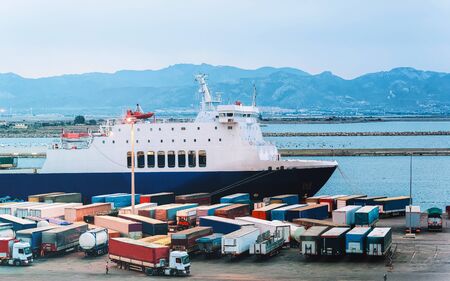 Waggons of vans in port in Cagliari reflexの写真素材
