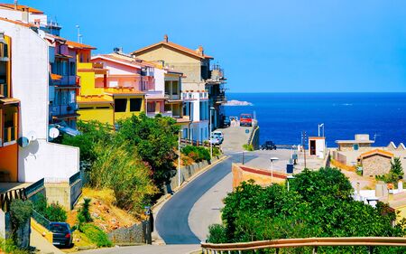 Cityscape of car road at Buggerru city at Mediterranean Sea Sardinia reflexの写真素材