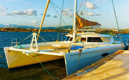 Harbor with Luxury ship at Olbia Sardinia reflexの写真素材
