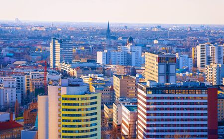 Apartment in residential building exterior. Housing structure at blue modern house of Europe. Rental home in city district on summer. Architecture for business property investment in Berlin, Germany.の写真素材