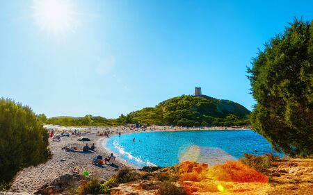 Landscape of Chia Beach and Blue Waters of the Mediterranean Sea in Province of Cagliari in South Sardinia in Italy. Scenery and nature. Mixed media.の写真素材