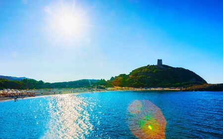 Landscape of Chia Beach and Blue Waters of the Mediterranean Sea in Province of Cagliari in South Sardinia in Italy. Scenery and nature. Mixed media.の写真素材