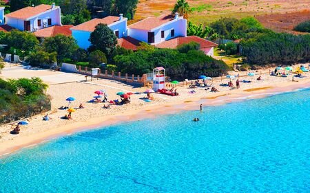 Landscape of Chia Beach and Blue Waters of the Mediterranean Sea in Province of Cagliari in South Sardinia in Italy. Scenery and nature. Mixed media.の写真素材