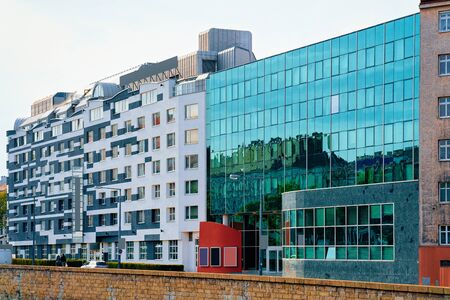 Modern apartment residential and flat building exterior in Vienna, Austria. New luxury house and home complex. City Real estate property and condo architecture. Facade of condominium block.の写真素材