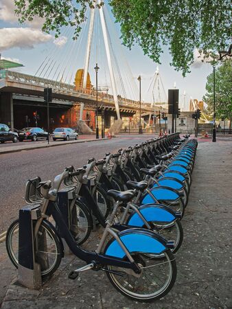 Bicycles at Hungerford ang Golden Jubilee Bridge in Lambeth in London, the UK. Mixed media.の写真素材
