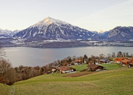 Winter in Swiss Alps near the Thun lake. Mixed media.の写真素材