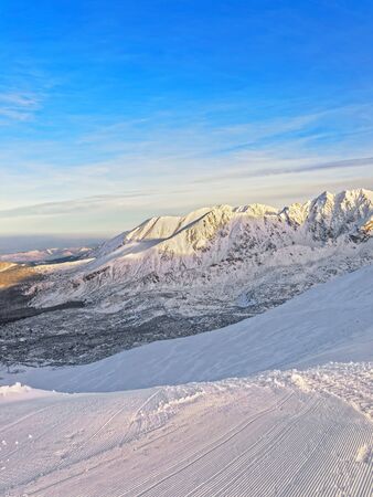 Sunny weather on the Kasprowy Wierch in Zakopane in Tatra Mounts in winterの写真素材
