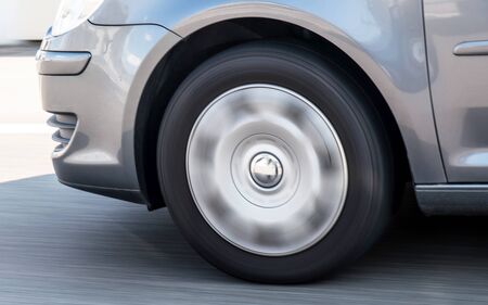 Car tire in road in Switzerlandの写真素材