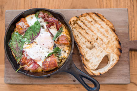 baked egg breakfastの写真素材