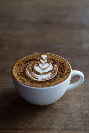 hot coffee on wooden background