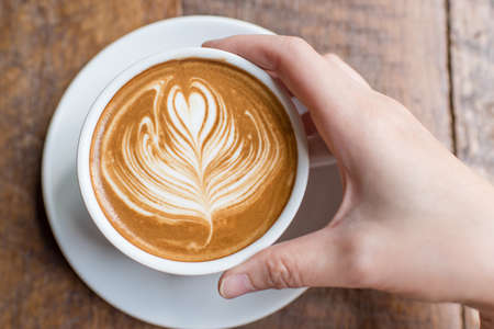 hot coffee on wooden backgroundの写真素材